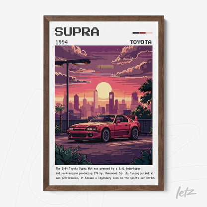 quadro com arte em pixel art de um carro Toyota Supra a céu aberto com pôr do sol ao fundo em moldura marrom