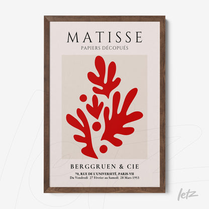 quadro com arte de Matisse, apresentando formas abstratas vermelhas em um fundo claro, com moldura de madeira escura