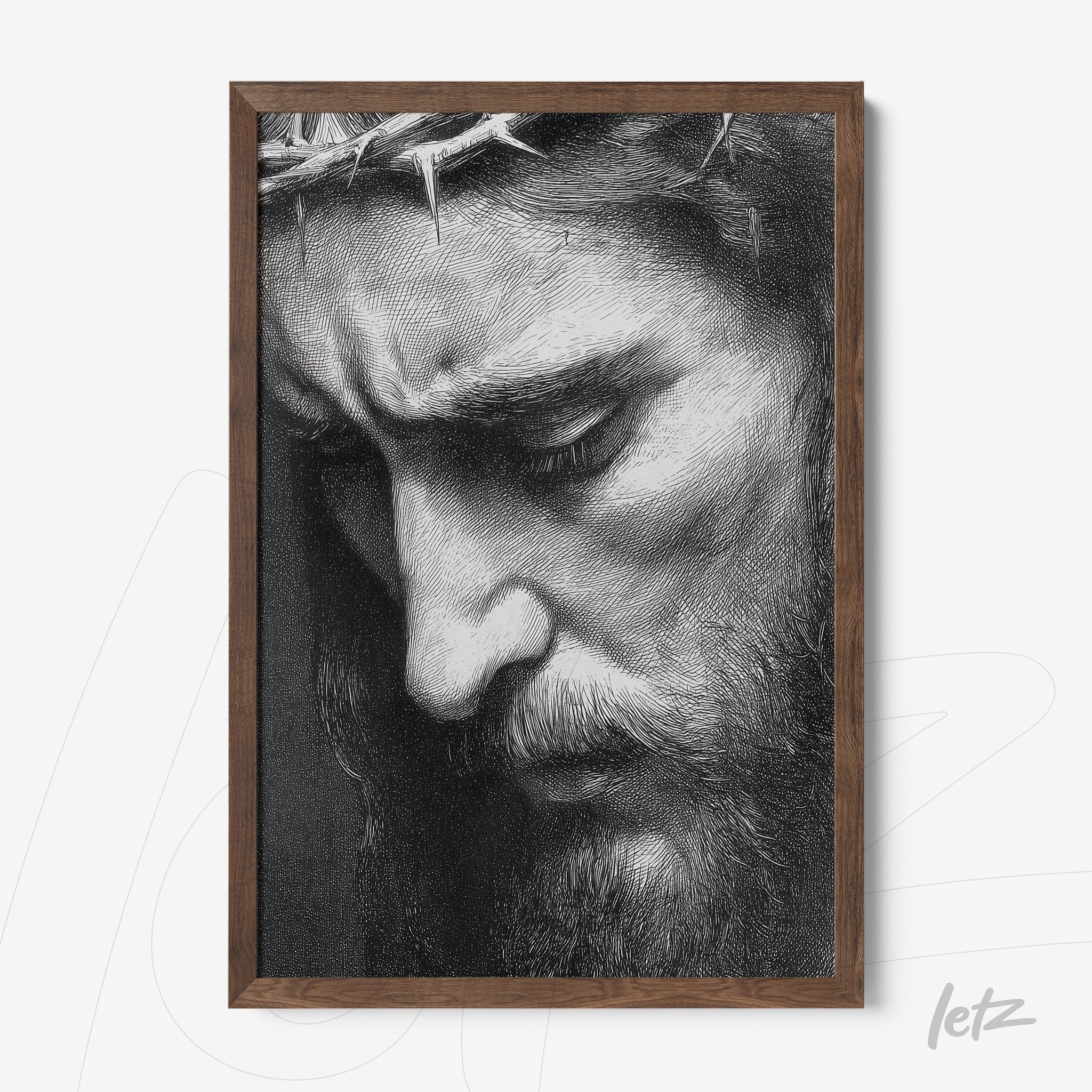 quadro em moldura de madeira escura com retrato em preto e branco de perfil de homem de barba com expressão pensativa