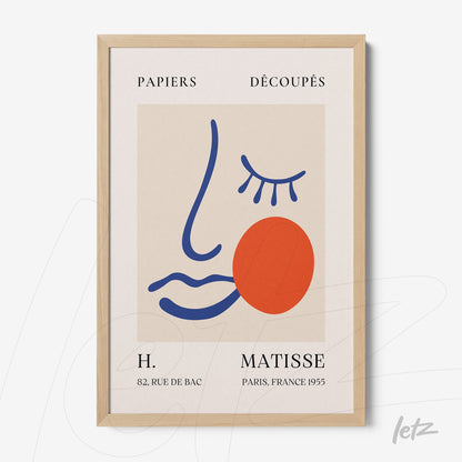 quadro em estilo contemporâneo com arte abstrata de rosto em cores vibrantes, moldura de madeira clara