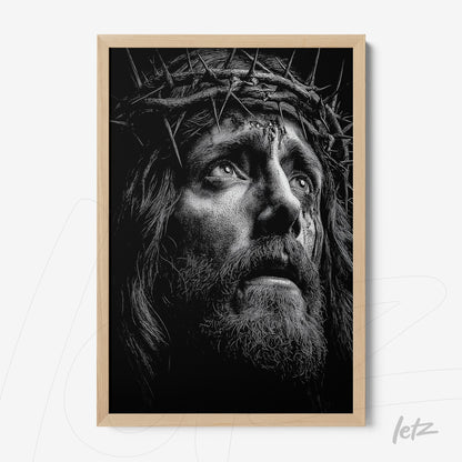quadro de retrato em preto e branco de figura religiosa com coroa de espinhos em moldura de madeira clara
