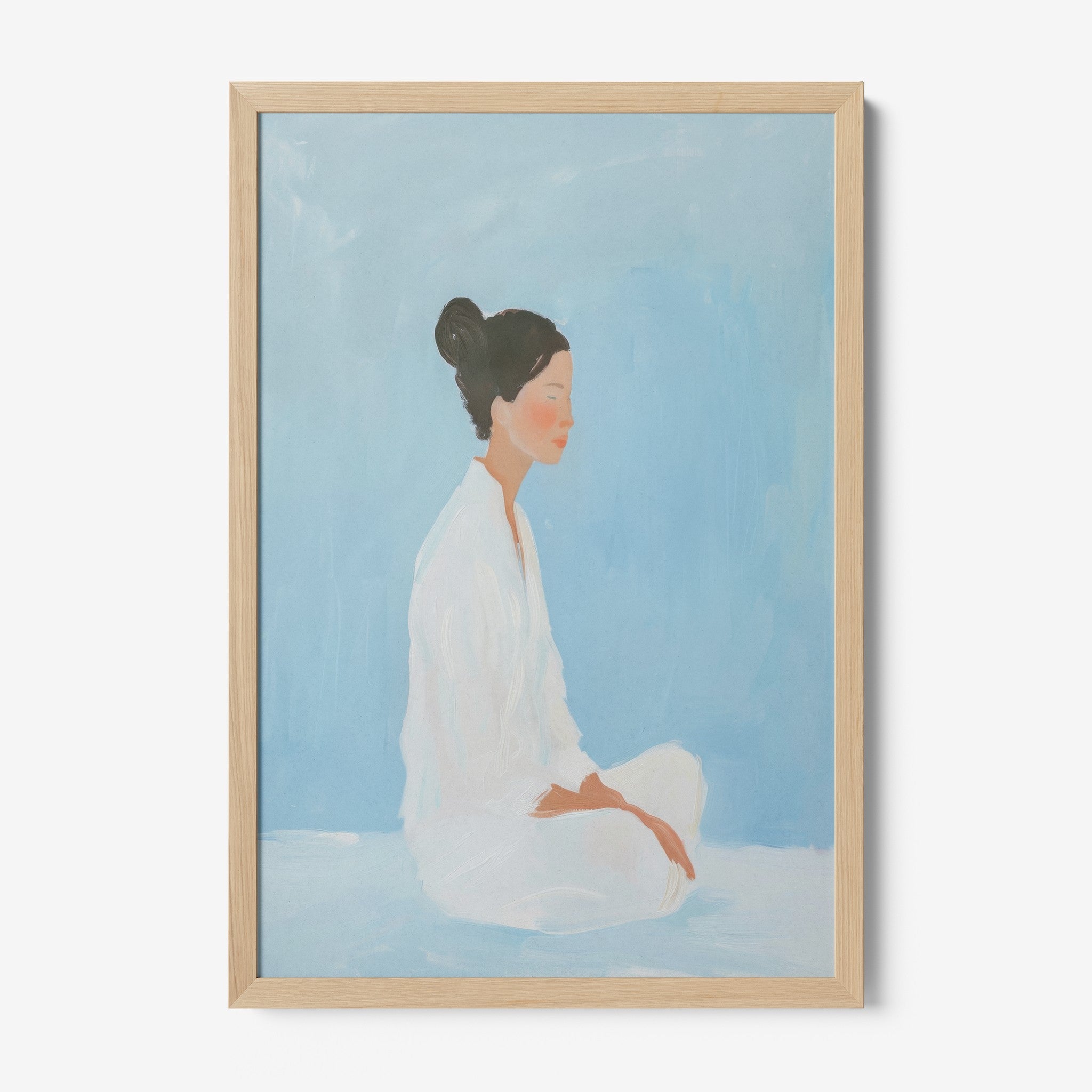 quadro com arte minimalista de mulher em meditação com fundo azul claro e moldura de madeira clara