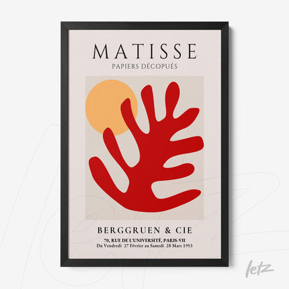 quadro com arte abstrata em estilo moderno com fundo claro, detalhe em vermelho de forma orgânica semelhante a uma folha e círculo amarelo, moldura preta