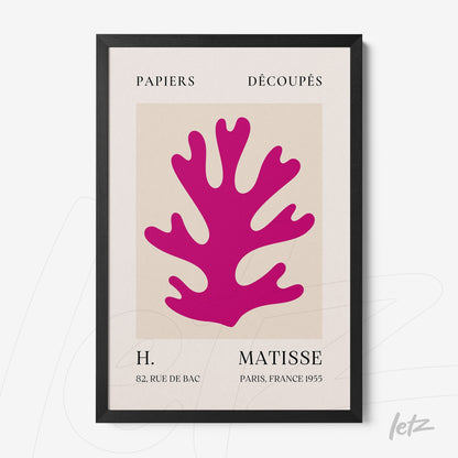 quadro com arte recortada em papel na cor rosa vibrante, moldura preta e fundo claro