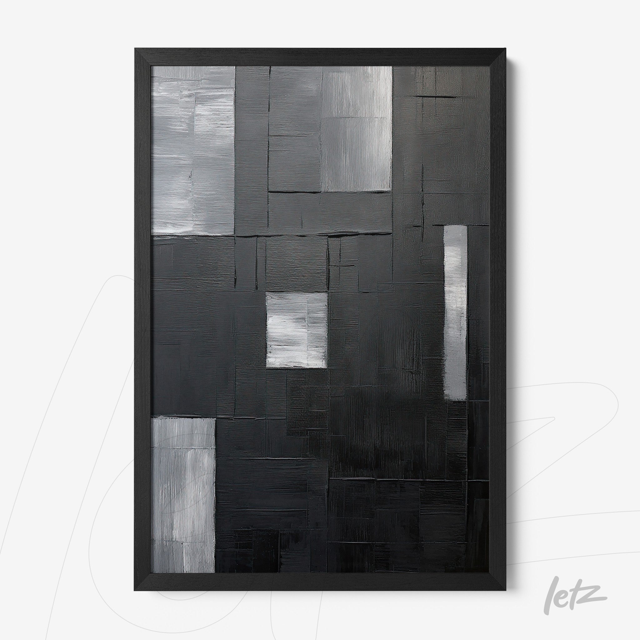 quadro abstrato em preto e branco com formas geométricas em diferentes texturas, moldura preta