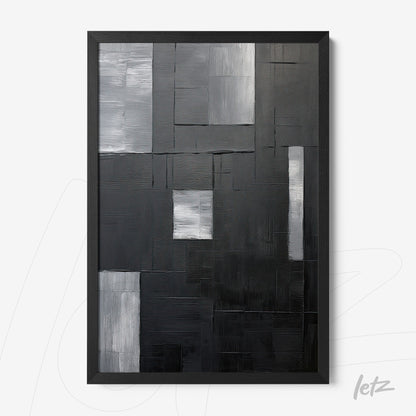 quadro abstrato em preto e branco com formas geométricas em diferentes texturas, moldura preta