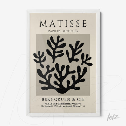 quadro com arte moderna de folhagens em recortes, emoldurado com moldura branca