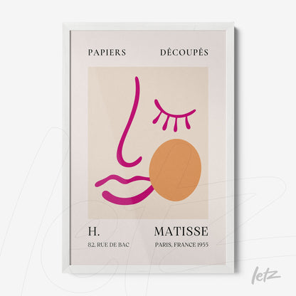 quadro com arte minimalista representando um rosto estilizado, com traços em rosa e laranja, moldura branca