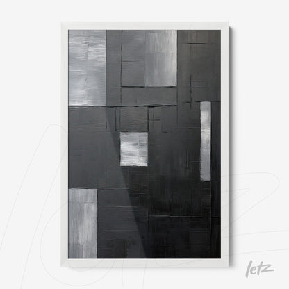 quadro abstrato em tons de cinza e preto com moldura branca