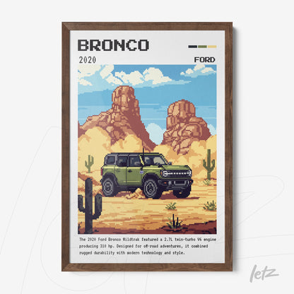 quadro decorativo com arte pixelada do Ford Bronco em um cenário desértico com cactos e montanhas ao fundo, moldura em madeira escura