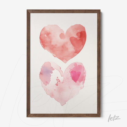 quadro com ilustrações de corações em aquarela nas cores rosa e vermelho, em moldura de madeira escura