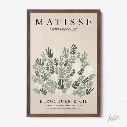 quadro com arte de folhas em tons de verde e branco, com moldura de madeira escura inspirado em Matisse
