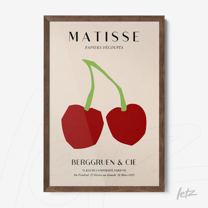 quadro com arte abstrata de cerejas em cores vermelha e verde, com moldura de madeira escura