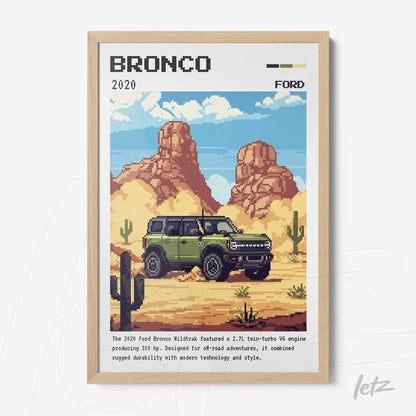quadro com ilustração em pixel art de um carro Ford Bronco verde em um deserto árido com montanhas ao fundo, moldura clara de madeira
