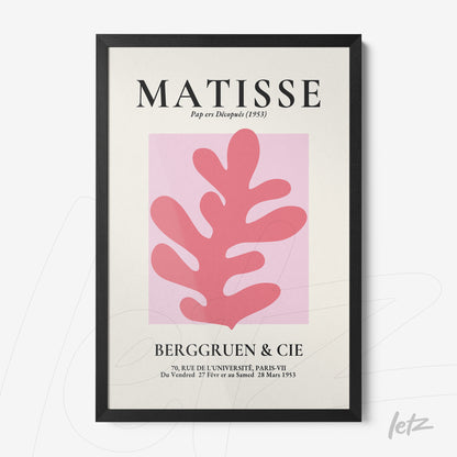 quadro com arte em estilo moderno, apresentando folhas em tons de rosa sobre fundo claro, moldura preta