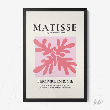 quadro com arte moderna em moldura preta, destacando formas orgânicas em tons de rosa sobre fundo pastel