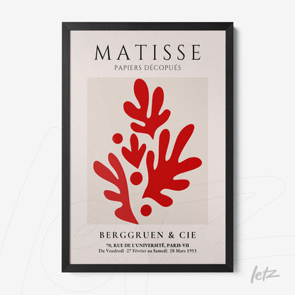 quadro com arte em recorte de papel no estilo de Henri Matisse, exibindo formas abstratas vermelhas sobre fundo claro, em moldura preta