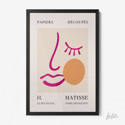 quadro com arte moderna de linha em fundo claro, representando rostos estilizados com detalhes em rosa e laranja, moldura preta