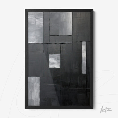 quadro abstrato em tons de preto e cinza, com traços texturizados e moldura preta