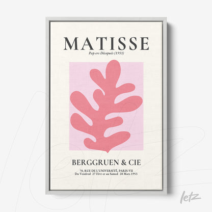 quadro com arte moderna inspirada em Matisse, apresentando uma folha em rosa sobre fundo rosa claro, moldura prateada