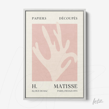 quadro decorativo com arte abstrata de mão em fundo rosa claro e moldura prata