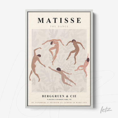 quadro emoldurado com arte estilizada representando a dança, com figuras nude em várias poses, fundo claro e elementos botânicos em tons neutros