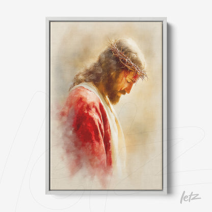 quadro com retrato de Jesus com coroa de espinhos, apresentando fundo suave em tons claros e moldura prata