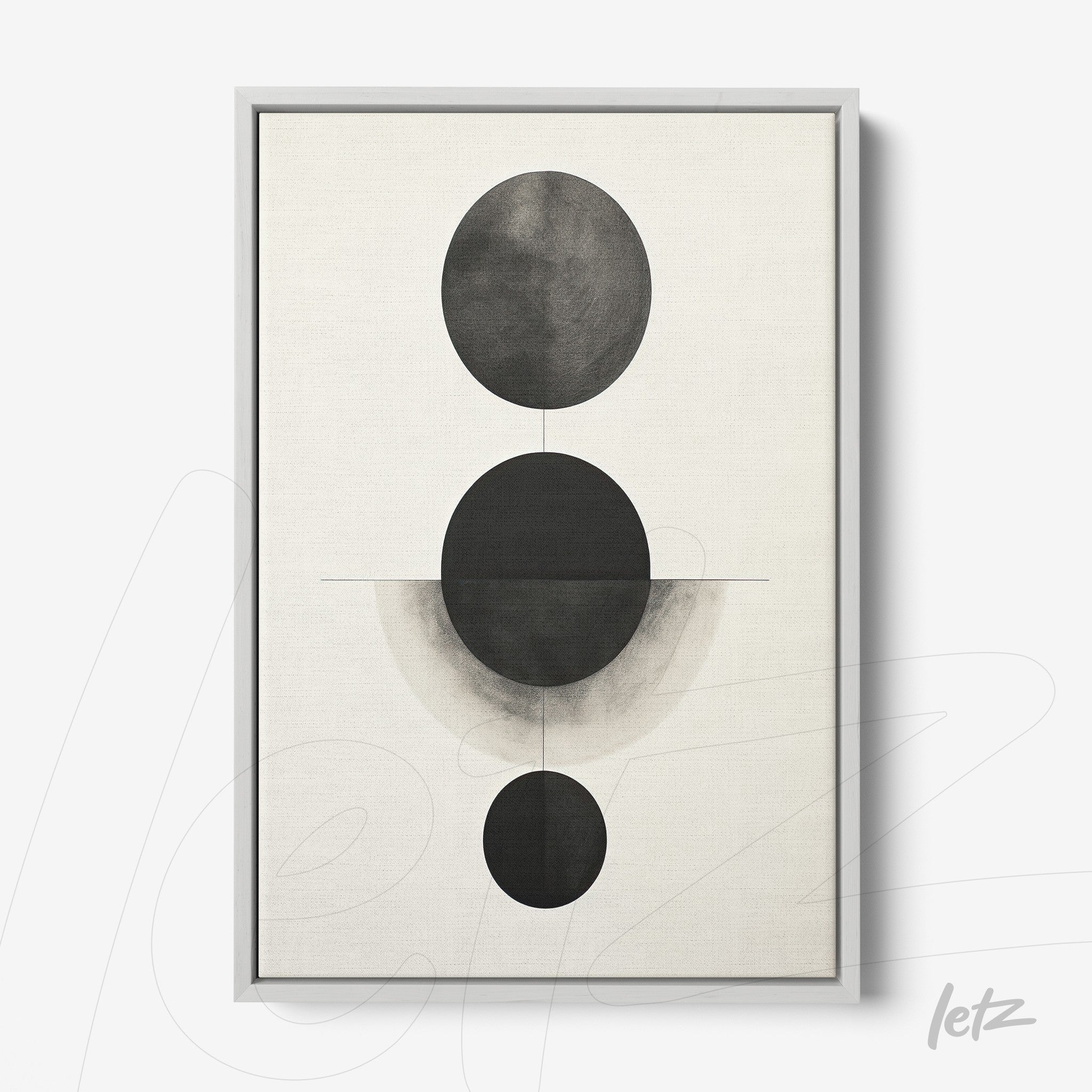 quadro minimalista com composição de círculos pretos sobre fundo claro em moldura prata