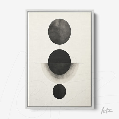quadro minimalista com composição de círculos pretos sobre fundo claro em moldura prata