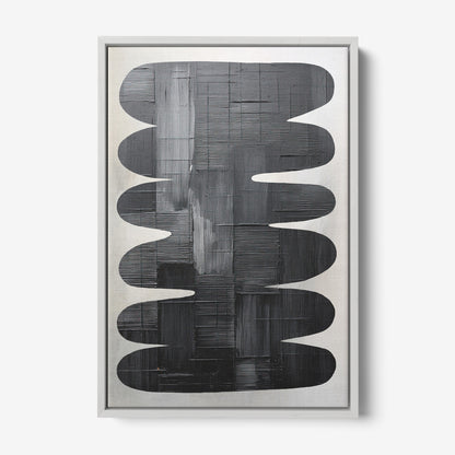 quadro com arte abstrata em tons de preto sobre fundo claro, emoldurado com moldura prateada