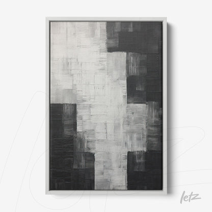 quadro abstrato com textura em tons de preto, branco e cinza, em moldura prata