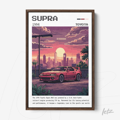 quadro com arte pixelada de um carro Toyota Supra 1994 em moldura de madeira escura, com fundo de pôr do sol e paisagem urbana