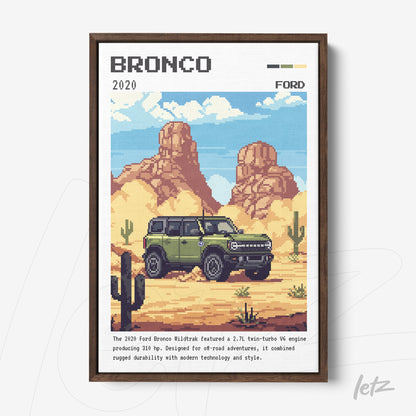 quadro com arte digital em estilo pixelado do Ford Bronco 2020 estacionado em um cenário desértico com cactos e montanhas ao fundo, moldura marrom escura