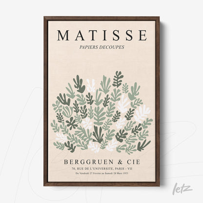 quadro com arte no estilo de Matisse apresentando folhas estilizadas em verde e branco, moldura escura de madeira