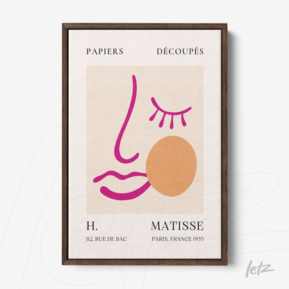 quadro decorativo com arte moderna de rosto estilizado em cores vibrantes, moldura de madeira escura