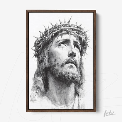 quadro com retrato em preto e branco de Jesus Cristo com coroa de espinhos em moldura de madeira escura