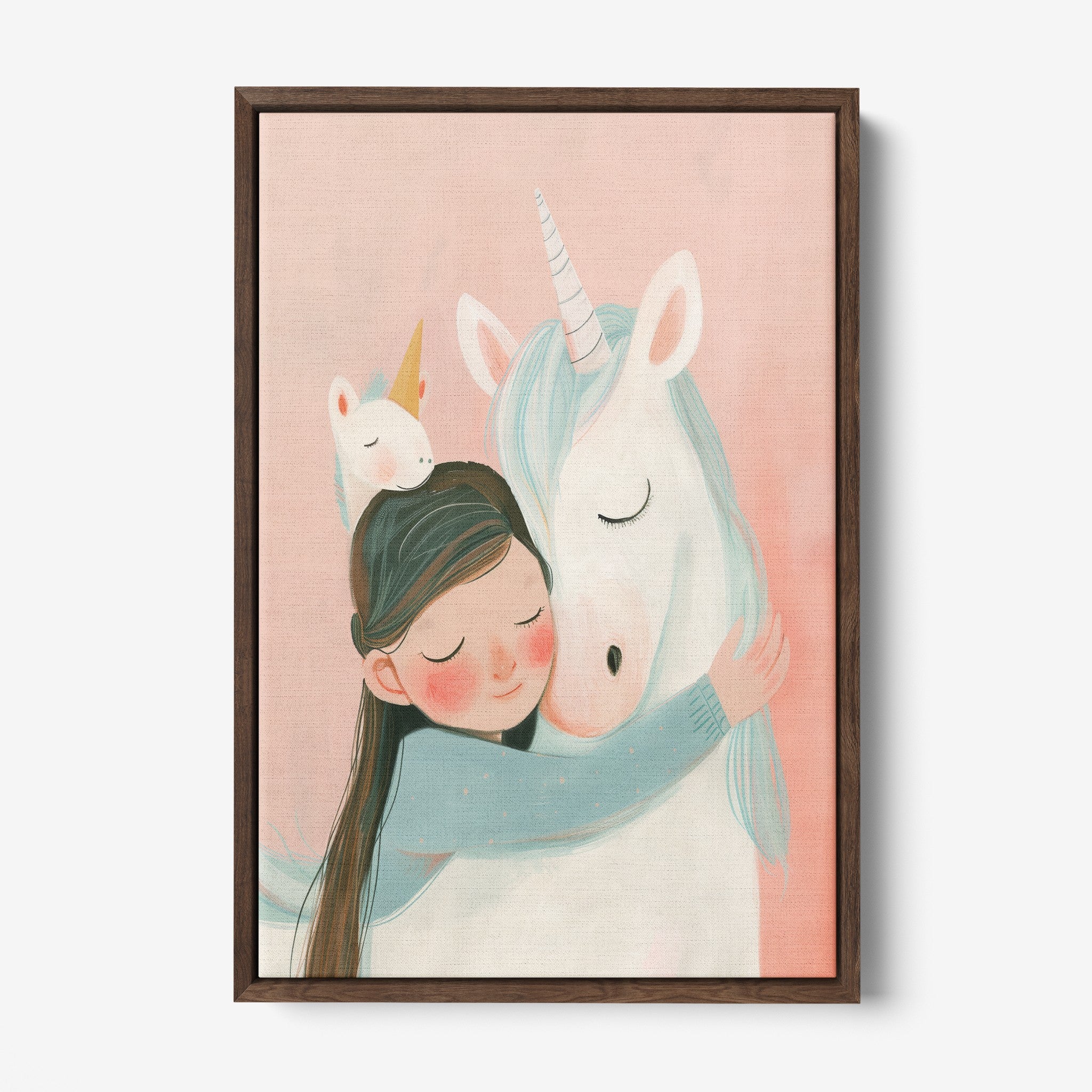 quadro em canvas com ilustração infantil de menina abraçando um unicórnio em fundo rosa