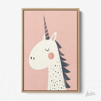 quadro em canvas com ilustração de unicórnio em fundo rosa claro e moldura de madeira clara