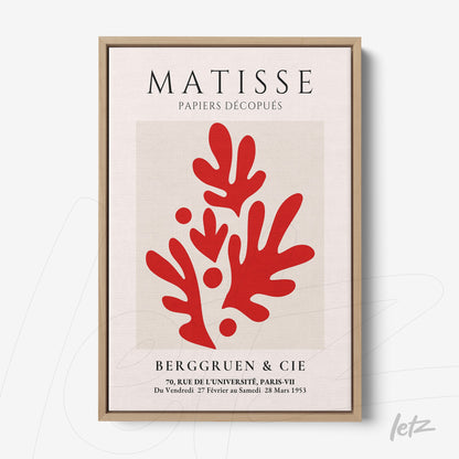 quadro com arte de recortes em tons vermelhos inspirado em Matisse, moldura de madeira clara