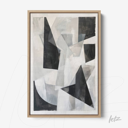 quadro com arte abstrata em tons de cinza e preto, com formas geométricas sobre fundo claro, moldura de madeira clara