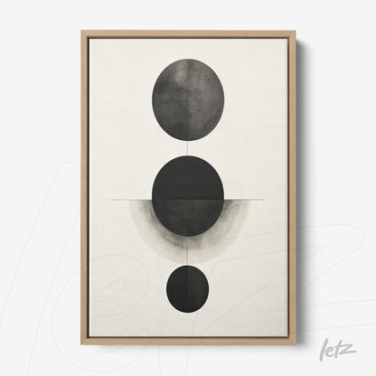 quadro com arte abstrata em preto e branco com círculos em diferentes tamanhos em moldura de madeira clara