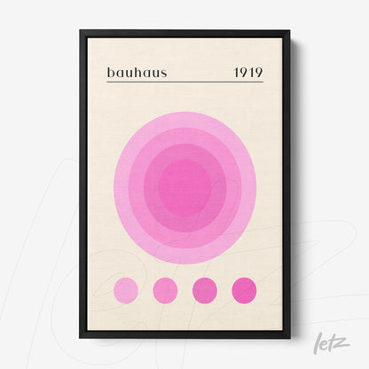 quadro bauhaus de círculos rosa em moldura preta sobre fundo bege