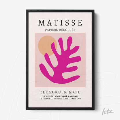 quadro com arte moderna em moldura preta, apresentando uma folha pink sobre um fundo claro com formas geométricas