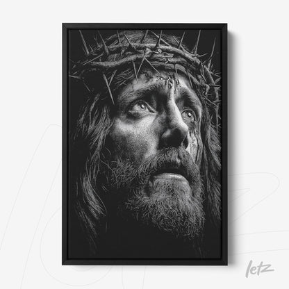 quadro em preto e branco com retrato de Jesus Cristo usando coroa de espinhos em moldura preta