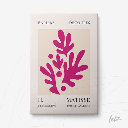 quadro com arte moderna de formas estilizadas em cores rosa sobre fundo creme, com moldura branca