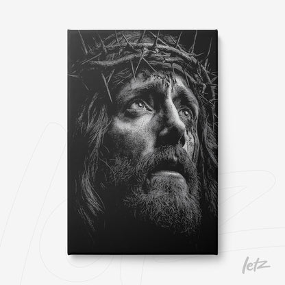 quadro em canvas com retrato em preto e branco de Jesus Cristo com coroa de espinhos e expressão de dor