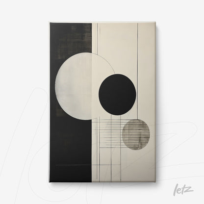 quadro em canvas com composição abstrata em preto e branco, apresentando círculos em diferentes tamanhos e texturas sobre fundo claro