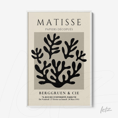 quadro com arte moderna em moldura branca apresentando figuras abstratas de plantas em fundo claro com texto em preto