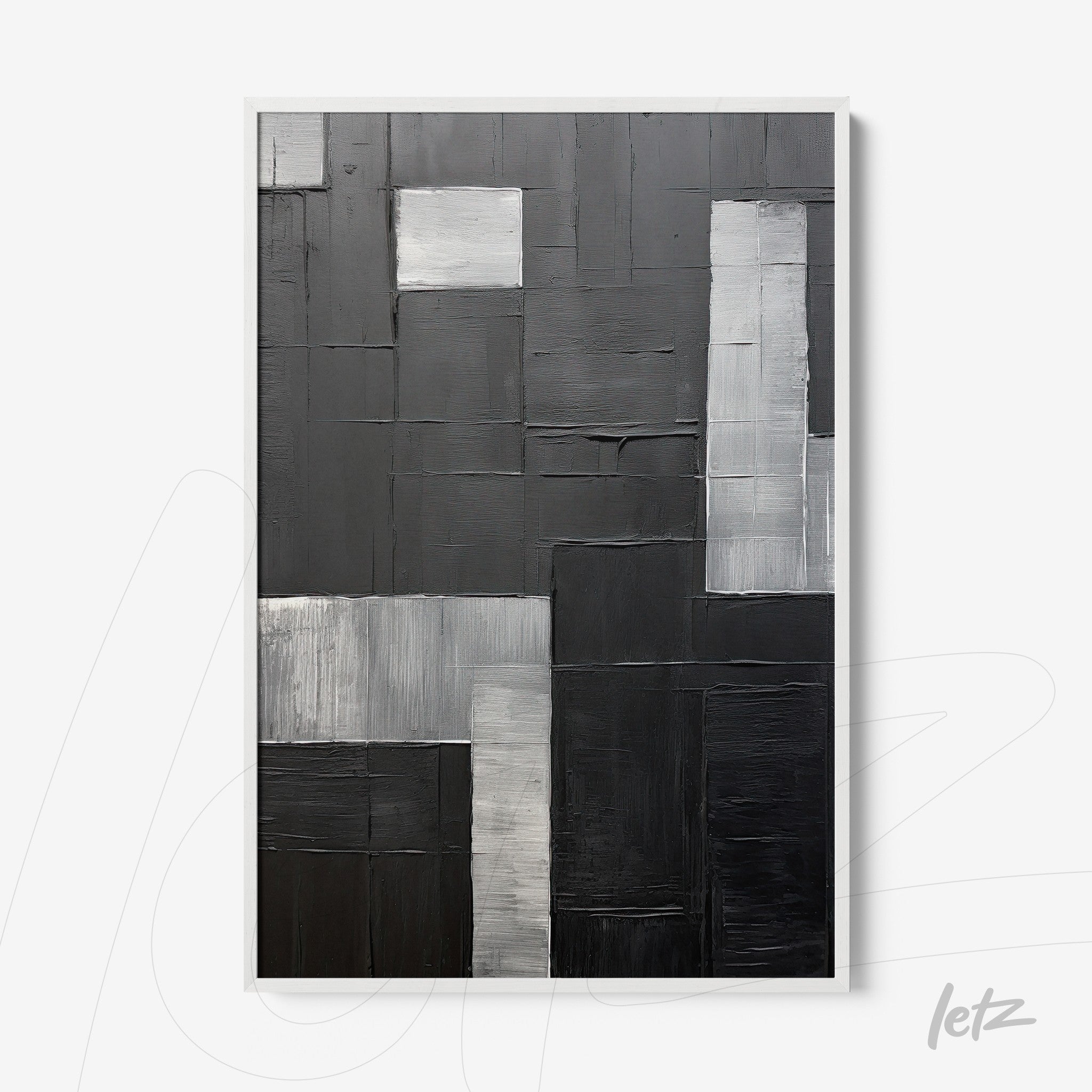 quadro abstrato em preto e branco com texturas em diferentes tons de cinza em moldura branca