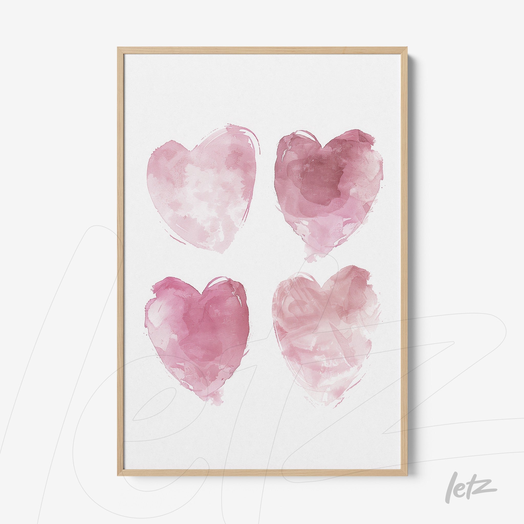 quadro com quatro corações em aquarela rosa em moldura de madeira clara